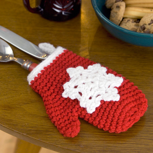 11 easy diy yarn projects to make as holiday gifts Snowflake Mitten Holiday Ornament Crochet Pattern from Red Heart Yarn