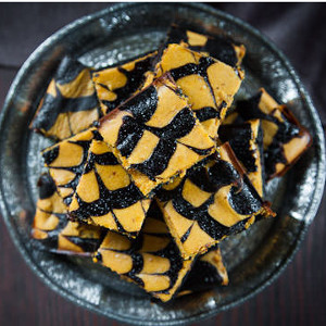 Irresistible Dark Chocolate Pumpkin Cheesecake Brownies