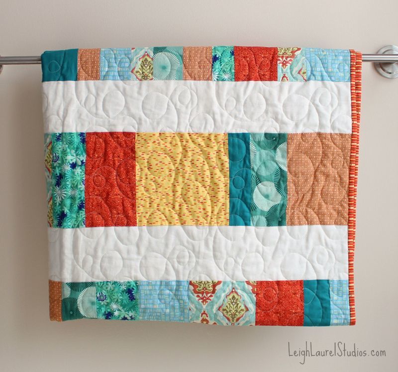 Bright and Cheery Fat Quarter Crib Quilt | FaveQuilts.com