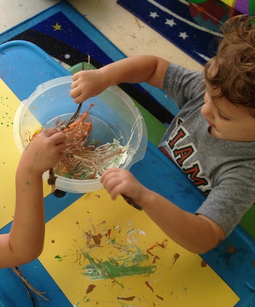 Painting with Sticks Earth Day Activity