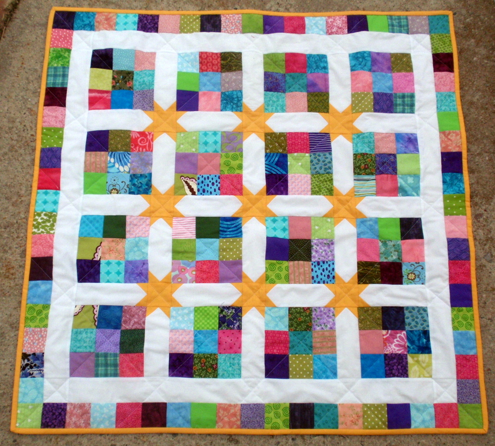 Rainbow Star Quilt Tutorial | FaveQuilts.com