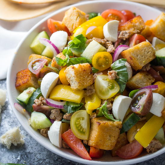 Sausage and Pepper Panzanella Salad with Smoky Buttermilk Vinaigrette Sausage and Pepper Panzanella Salad with Smoky Buttermilk Vinaigrette