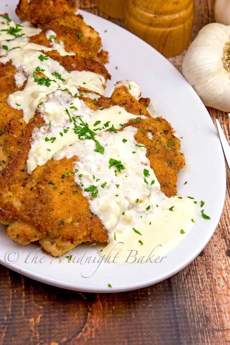 Garlic Smothered Pan-Fried Chicken | FaveSouthernRecipes.com