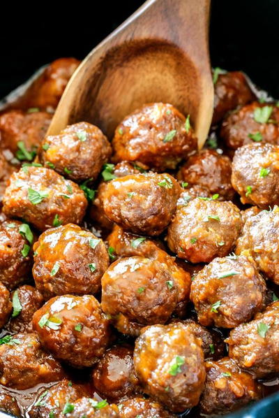 Sweet and Spicy Slow Cooker Meatballs Sweet and Spicy Slow Cooker Meatballs