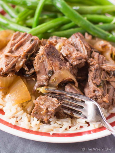 Slow Cooker Pot Roast Loaded With Garlic and Onions