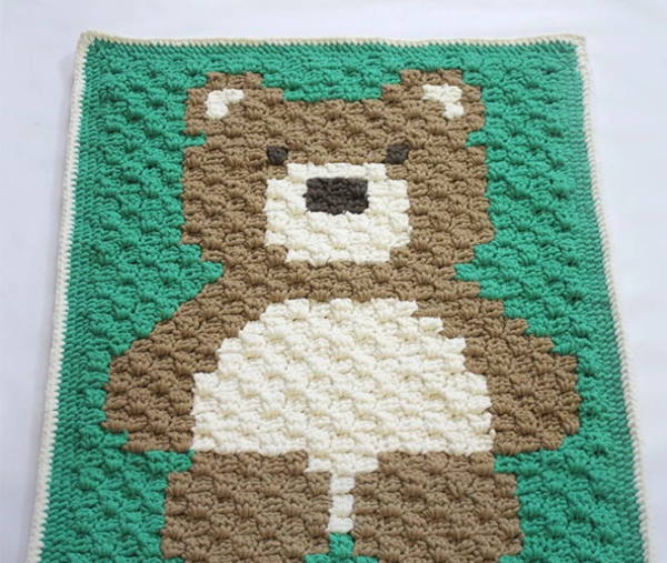 Image shows the Cuddly Teddy Bear Crochet Baby Blanket.