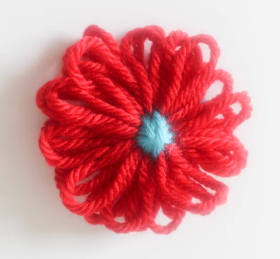 How to Make a Yarn Flower with a Flower Loom