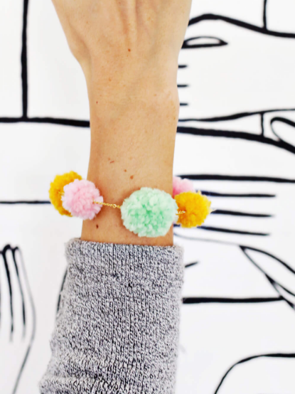 Girly DIY Pom Pom Bracelet Girly DIY Pom Pom Bracelet
