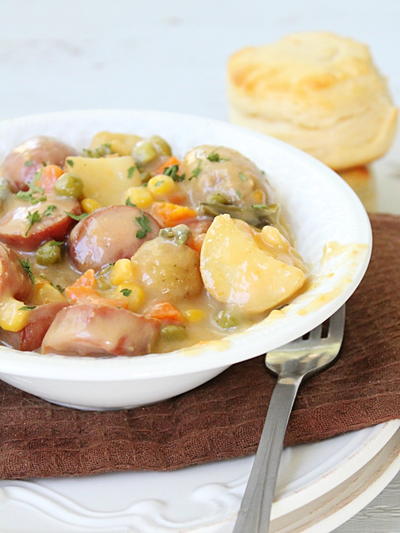 Slow Cooker Sausage Potato and Cheese Stew