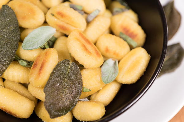 Gnocchi With Crispy Sage Chips And Fresh Sage Leaves Gnocchi With Crispy Sage Chips And Fresh Sage Leaves