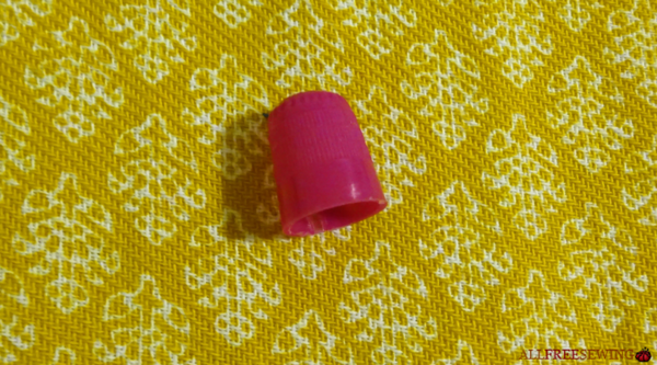 Image shows a closed top thimble.