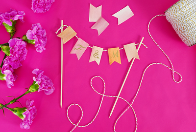 DIY Watercolor Bunting Wedding Cake Topper