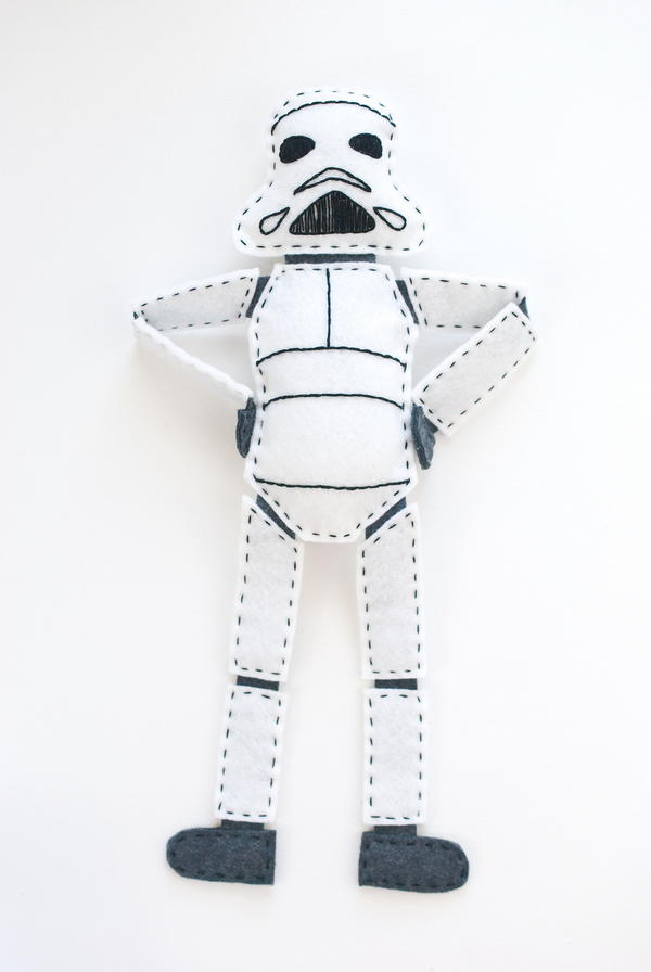 Image shows the Star Wars-Inspired DIY Felt Stormtrooper Pattern on a light gray background.