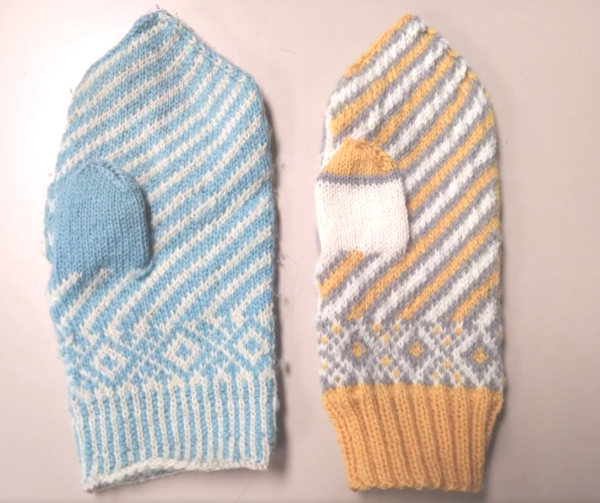Two differently sized mittens