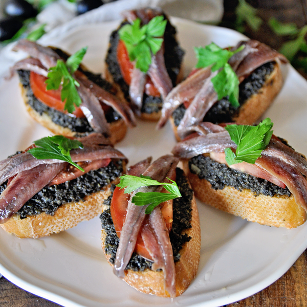 Spanish Montaditos with Black Olive Tapenade and Anchovies Spanish Montaditos with Black Olive Tapenade and Anchovies