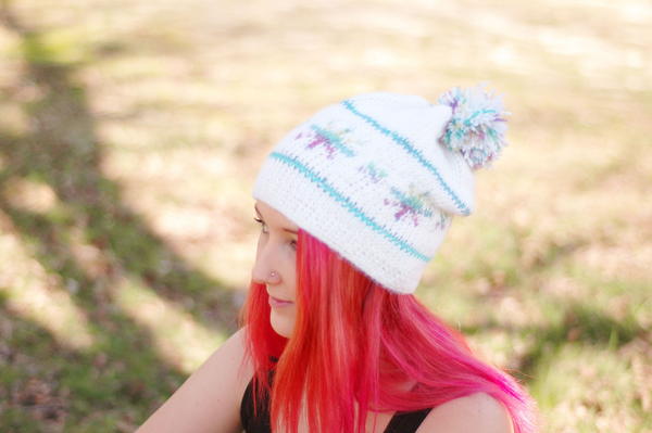 image shows the Stunning Snowflake Tunisian Crochet Hat.