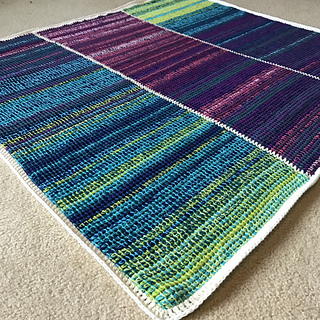 Image shows the Tunisian Temperature Blanket from Nona Davenport from Ravelry.