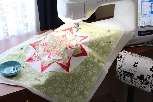 Reignite Your Creative Spark - image shows a sewing machine and quilted fabric square.