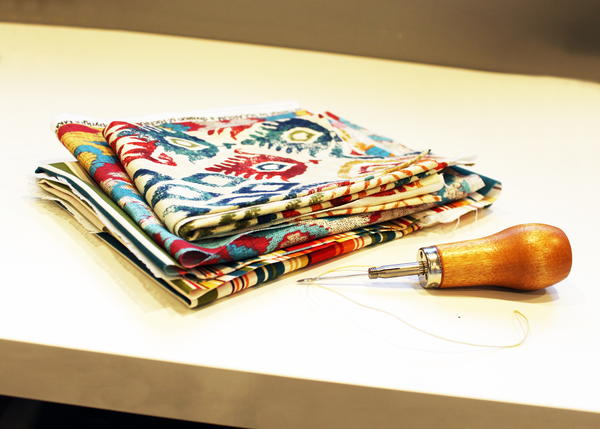 Example of canvas and sewing awl.