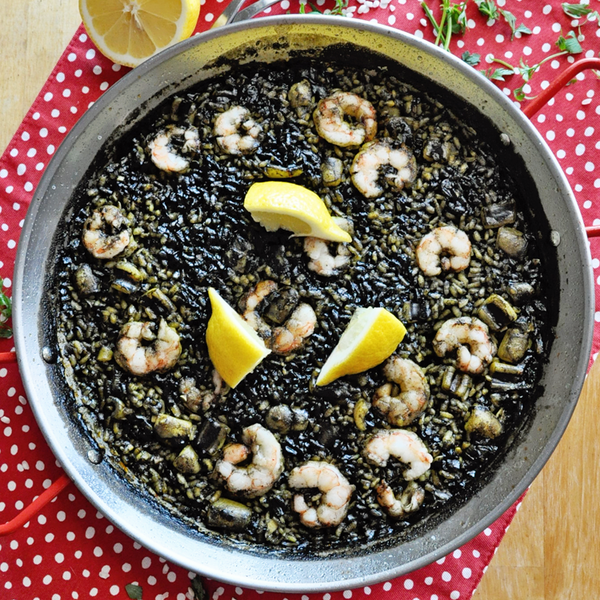 Spanish Black Rice Paella with Squid Ink Based Broth Spanish Black Rice Paella with Squid Ink Based Broth