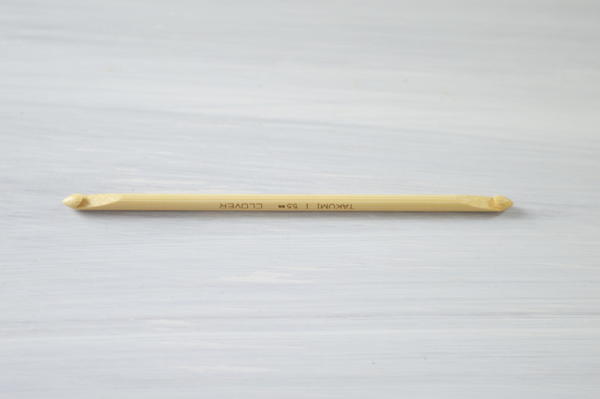 Image shows a double-ended Tunisian crochet hook in full.