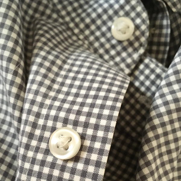 Shirt with buttons.