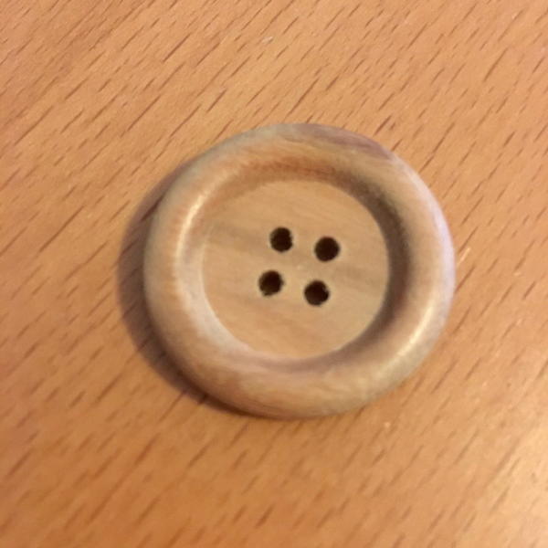 Wood button.