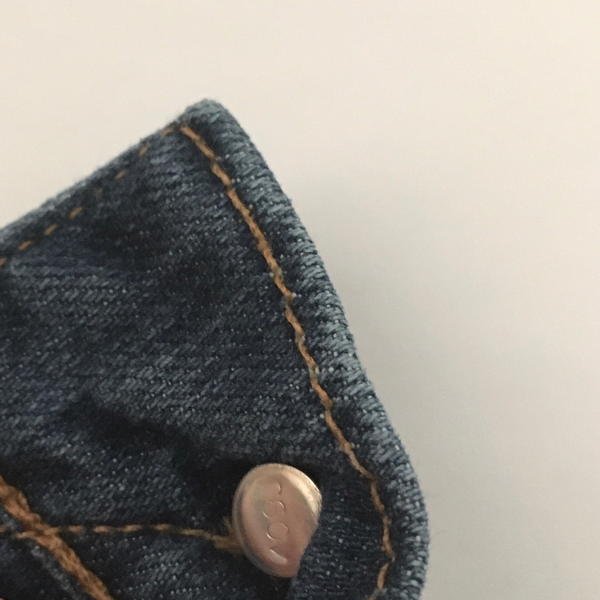 Jeans with a button.