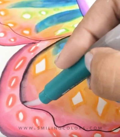Painting A Butterfly In Rainbow Colors