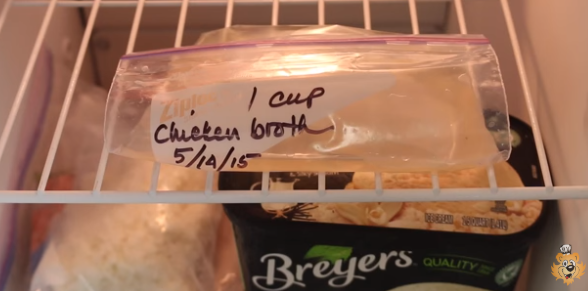 Frozen chicken broth in bag in freezer