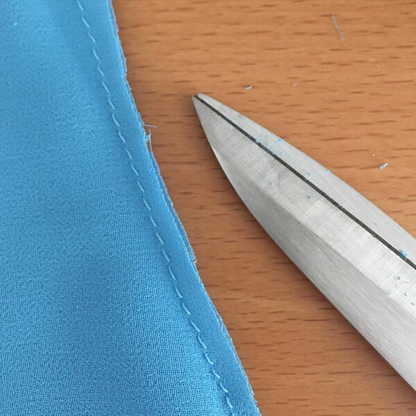 Image shows Step 3 (after) for how to sew French seams.