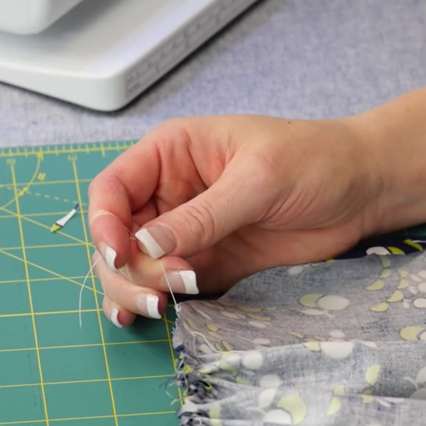 Gathering fabric with dental floss