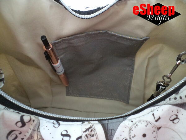 Image shows a handmade purse that has a patch pocket with a little extra.