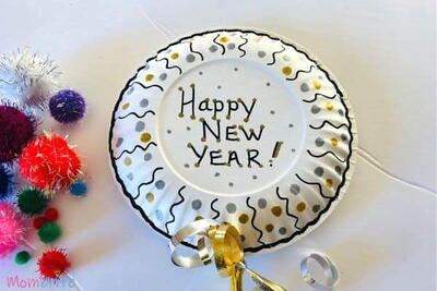 Paper Plate New Year’s Noisemaker Craft