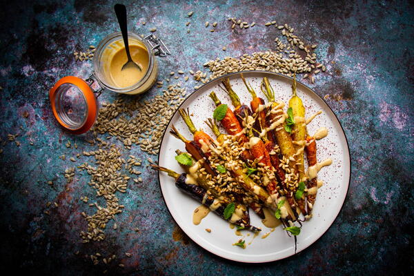 Roasted Rainbow Carrots with Sumac Mint and Toasted Sunflower Dressing Roasted Rainbow Carrots with Sumac Mint and Toasted Sunflower Dressing