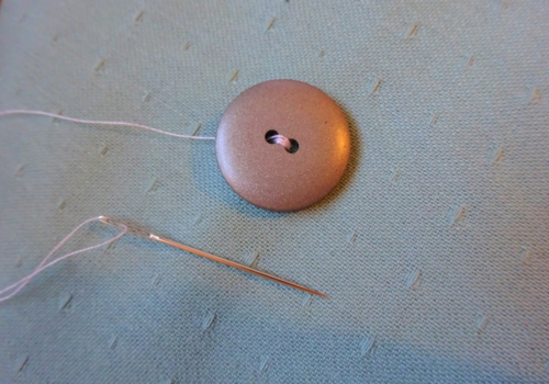 How to Sew a Two-Hole Button How to Sew a Two-Hole Button