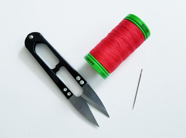 Threading a sewing needle: supplies