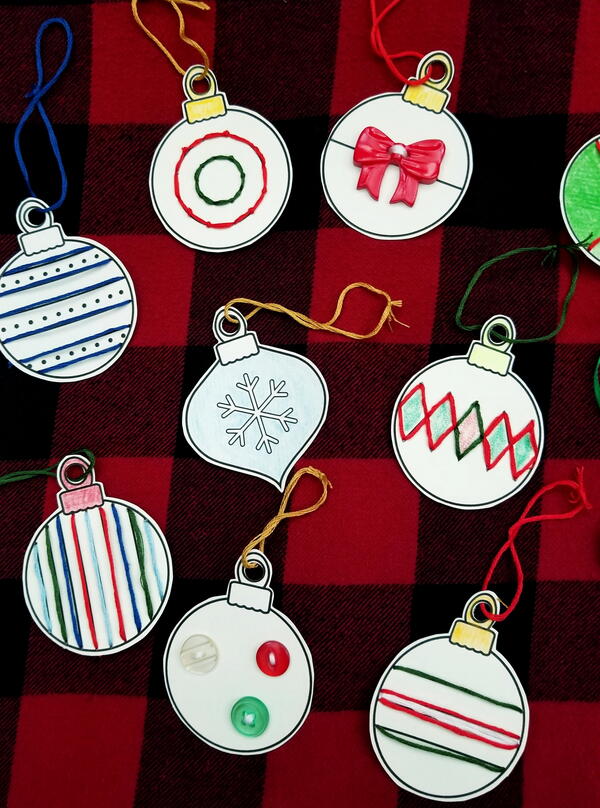 Image shows the Finished Christmas Baubles Printable Lacing Cards