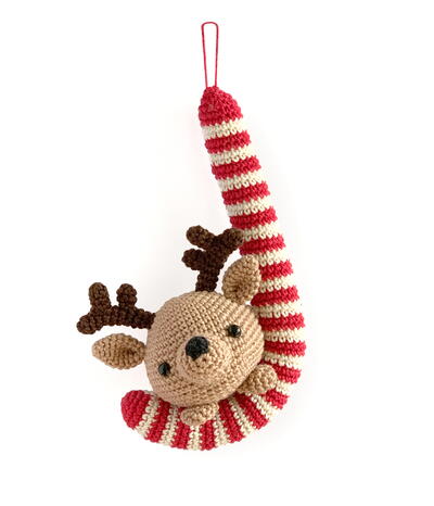 Reindeer On A Candy Cane Christmas Ornament