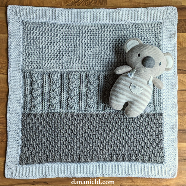 Woven Cables Panel-style Crochet Baby Blanket Woven Cables Panel-style Crochet Baby Blanket
