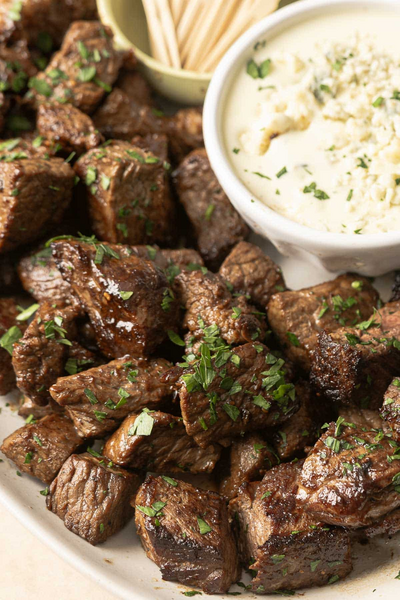 Steak Bites Appetizer With Blue Cheese Sauce Steak Bites Appetizer With Blue Cheese Sauce