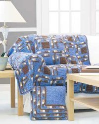 A Beautifully Designed Afghan and Pillows Set