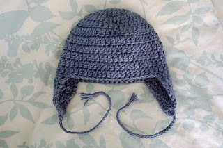 Free Crochet Star Baby Earflap Hat pattern using Bernat Bundle Up