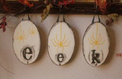 Eek Spider Plaques