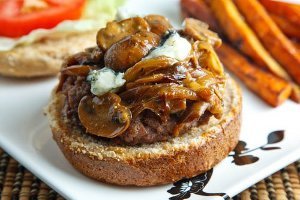 Burgers Topped with Caramelized Onions and Blue Cheese