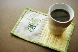 Elegantly Embroidered Mug Rug