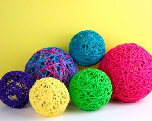Neon Yarn Globes | FaveCrafts.com