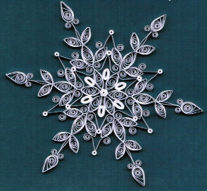 Delicate Quilled DIY Paper Snowflakes