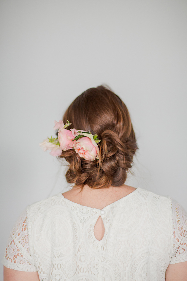 Elegant Floral Twisted Braid Bun | AllFreeDIYWeddings.com