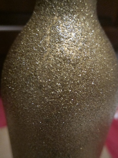 Sparkling Golden Champagne Bottle